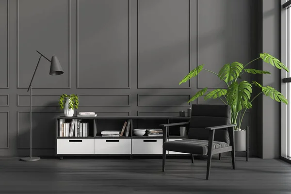 Dunkles Wohnzimmer Mit Sessel Auf Schwarzem Hartholzboden Beistelltisch Mit Büchern — Stockfoto