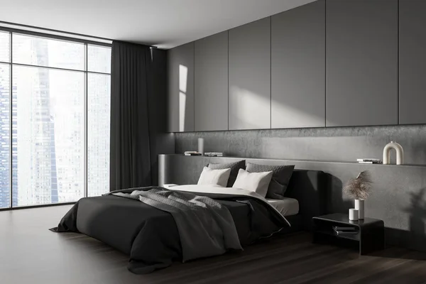 Corner view on dark bedroom interior with bed, bedsides, pillows, houseplant, wooden hardwood floor, panoramic window with Singapore view. Concept of minimalist design. Creative idea. 3d rendering