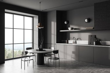 Gri duvarlı şık mutfak köşesi, beton zemin, lavaboda yapılmış gri dolaplar ve sandalyeli yuvarlak yemek masası. 3d oluşturma