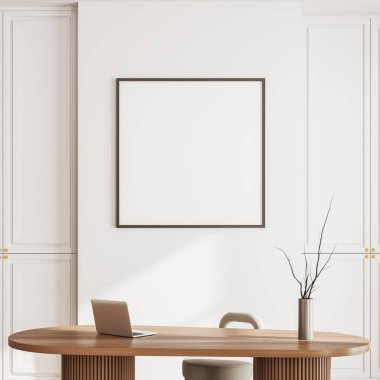 Çalışma odasının iç kısmında, ahşap ofis masasında dizüstü bilgisayar ve vazo var. Beyaz duvarda tuval kare posteri var. 3B görüntüleme