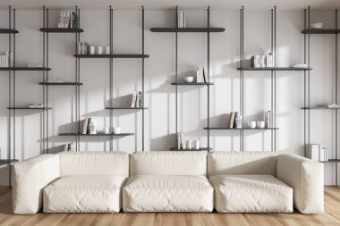 Ahşap zeminde yumuşak bir yeri olan beyaz, rahatlatıcı bir oda. Raflı, kitaplı ve şık dekorasyonlu soğuk bölge. 3B görüntüleme