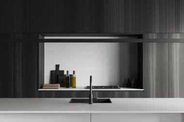 Karanlık ahşap mutfak içinde bar adası, lavabo ve soba var. Kaşık ve yağ şişeli mutfak gereçleri, güvertede havlu. Modern minimalist yemek pişirme alanı. 3B görüntüleme