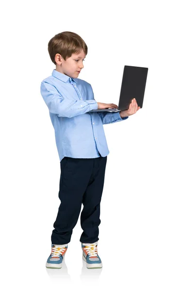 Мальчик Держит Ноутбук Руках Печатает Полная Изоляция Белом Фоне Концепция — стоковое фото
