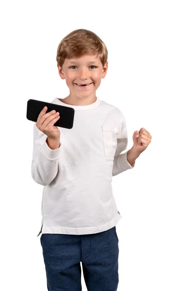 Happy Kid Boy Looking Camera Raised Fist Phone Hand Isolated — Stock Photo, Image