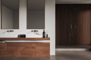Bej rengi otel banyosu, çift lavabo ve duş, gri beton zeminde ahşap şifonyer. Minimalist aksesuarlar ve aynalarla dolu sıcak bir banyo alanı. 3B görüntüleme