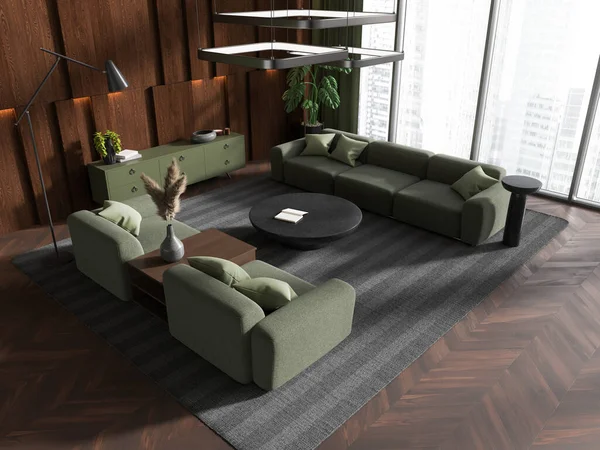 Top view of green and wooden home living room interior with sofa and armchair, coffee table on carpet. Modern relax corner with panoramic window on skyscrapers. 3D rendering