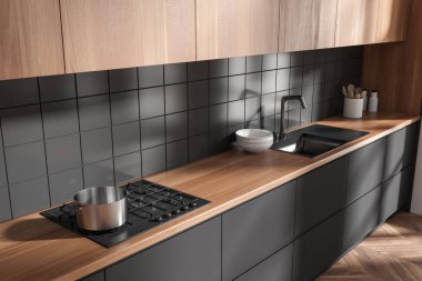 Ahşap mutfak manzarası, lavabo ve soba, güvertede minimalist mutfak malzemeleri. Ahşap zeminde gizli raf dizaynı olan yemek köşesi. 3B görüntüleme