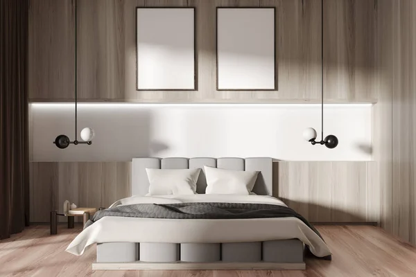 ナイトスタンドと装飾 ランプと堅木の床と光の寝室のインテリアベッド キャンバスのポスターを２枚モックアップ 3Dレンダリング — ストック写真