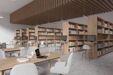 Kütüphanenin içini kitaplık ve bilgisayar, yan görüş masası ve gri beton zeminde sıralanmış sandalyelerle süsleyin. Üniversitede ya da okulda modern çalışma ve öğrenim köşesi. 3B görüntüleme