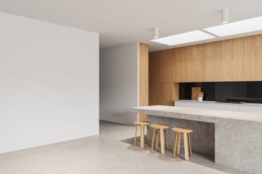 Beyaz duvarları, beton zemini, rahat ahşap dolapları ve dolapları olan modern mutfağın köşesi, ahşap sandalyeleri ve solunda boş fotokopi duvarı olan devasa taş adalar. 3d oluşturma