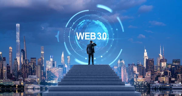 Rear view of confused businessman on top of stairs looking at futuristic web 3.0 and planet hologram in night city sky. Concept of new generation of internet and metaverse, cutting edge technology