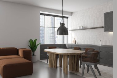 Yemek masası ve sandalyeli modern stüdyo iç mekanı, kanepeli yan görüş köşesi. Gökdelenlerde panoramik penceresi olan yemek pişirme ve gevşeme alanı. 3B görüntüleme