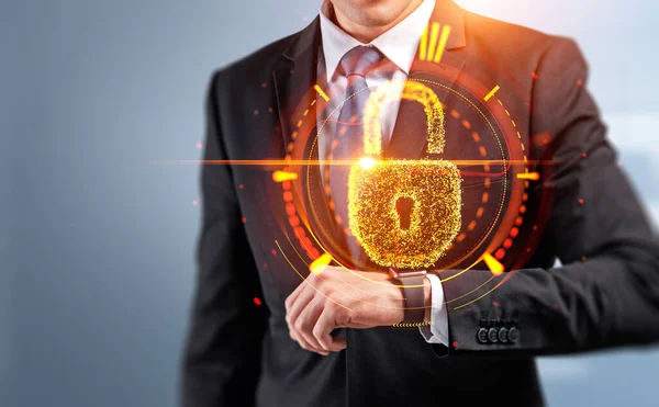 Businessman hand with smart watch, double exposure hud with glowing golden cybersecurity lock hologram with loading circles. Concept of data protection
