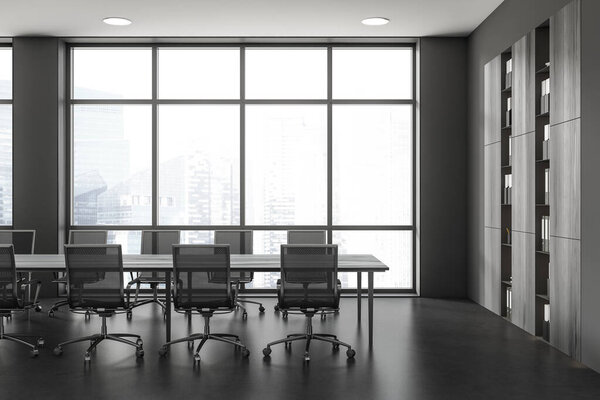 Dark office room interior with armchairs and board, shelf with business documents on black concrete floor. Panoramic window on Singapore skyscrapers. 3D rendering