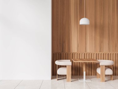Zemini döşemeli, beyaz ve ahşap duvarlı şık bir restoranın içi. İki beyaz koltuklu rahat kare masa ve solunda beyaz duvar kopyası. 3d oluşturma