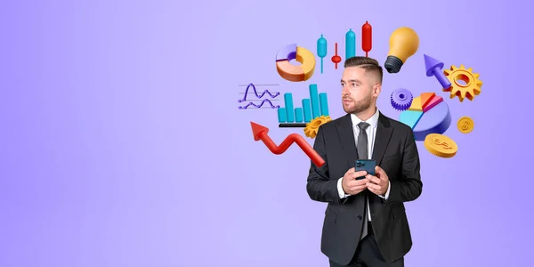 Handsome young European businessman with smartphone looking sideways at copy space standing over purple background with business plan icons, gears, lightbulb and graphs. Concept of business strategy