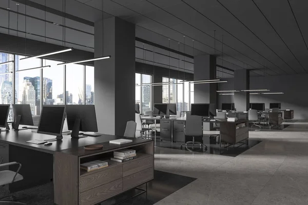 Corner of stylish open space office with gray walls and columns, tiled floor, rows of gray computer tables with chairs and large windows with cityscape. 3d rendering