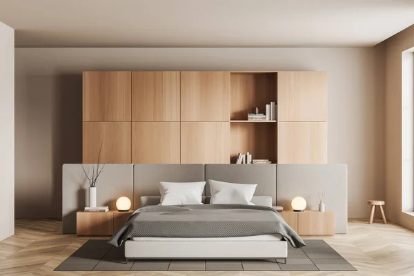 Beige bedroom interior with bed and accent wall, wooden shelf with stylish decoration, carpet on hardwood floor. Sleeping room with window. 3D rendering