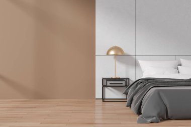 Beyaz ve bej duvarlı modern yatak odasının içi, ahşap zemin, gri battaniyeli ve komodinli rahat kral yatağı ve solunda uzay duvarının fotokopisi. 3d oluşturma