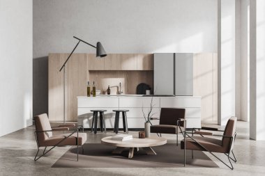 Beyaz duvarları, beton zemini, yuvarlak kahve masasının yanında duran bej koltukları ve arka planda beyaz dolapları ve barı olan modern çatı katı oturma odasının içi. 3d oluşturma