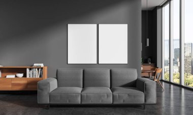 Gri duvarları, beton zemini, üzerinde iki dikey maket posterleri asılı rahat kanepe ahşap şifonyer ve arka planda yemek masası olan mutfak. 3d oluşturma