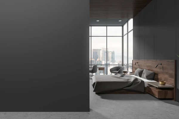 Dark home bedroom interior bed and armchairs on concrete floor. Stylish relax room with nightstand and desk, panoramic window. Mock up empty grey wall partition. 3D rendering
