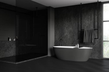 Gri ve fayanslı duvarları olan şık banyonun köşesi, beton zemin, rahat gri küvet ve cam duvarlı duş kabini. 3d oluşturma