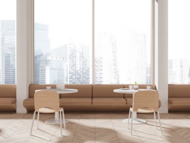Beyaz duvarları, ahşap zemini, yuvarlak masaların yanında duran rahat bej koltukları ve şehir manzaralı panoramik pencereleri olan modern kantinin içi. 3d oluşturma