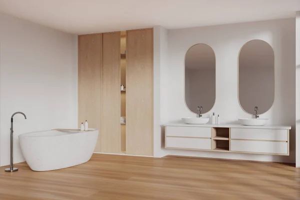 White and wooden home bathroom interior with bathtub and double sink, side view. Shelf and vanity with accessories, hardwood floor. Bathing corner with stylish furniture. 3D rendering