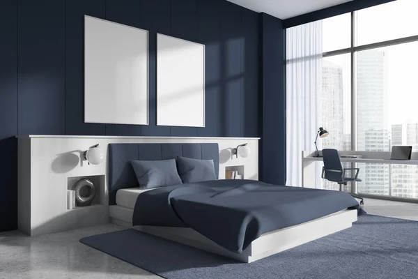 Cozy bedroom interior with sleep and work corner, side view. Bed with accent wall and decoration. Panoramic window on skyscrapers. Two mock up canvas posters in row. 3D rendering