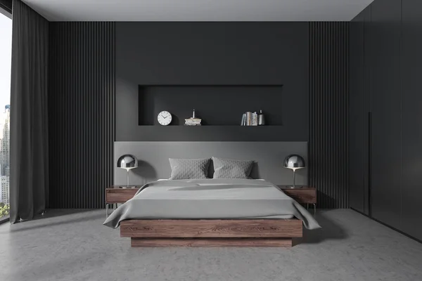 Dark home bedroom interior with bed and nightstand with decoration, grey concrete floor. Sleeping area in modern studio apartment with panoramic window. 3D rendering