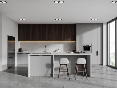 Bar tezgahı, taburesi ve beton zemini olan gri bir ev mutfağı. Buzdolabı, mutfak gereçleri ve tropiklerin panoramik penceresi olan şık bir mutfak tasarımı. 3B görüntüleme