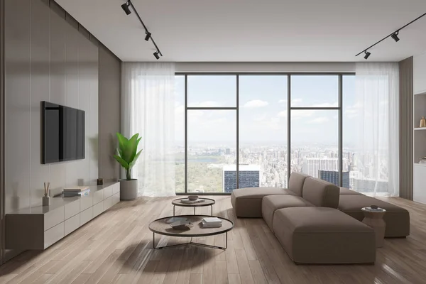 베이지색 편안한 베이지 라운드 테이블과 캐비닛 현대적인 Tv와 현대적인 거실의 — 스톡 사진