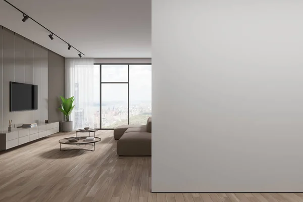 ソファーとコーヒーテーブル サイドボード付きのテレビディスプレイ付きの居心地の良いホームリビングルームのインテリア ニューヨークの高層ビルのパノラマ窓 空の壁のパーティションをモックアップします 3Dレンダリング — ストック写真