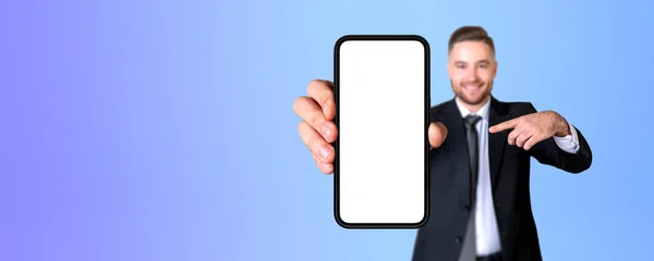 Portrait Blurry Young Businessman Pointing Smartphone Mock Screen Standing Purple — Stock Photo, Image