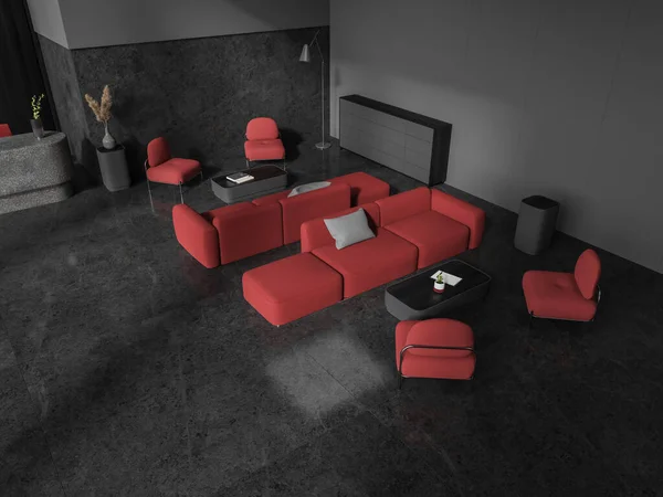 顶部的黑暗接待内部与红色扶手椅和沙发与咖啡桌 放松的地方与简约的家具 在办公室或酒店入口大厅的等候和会合处 3D渲染 — 图库照片