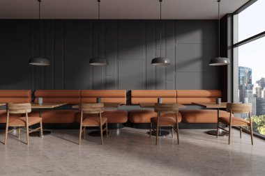 Geometrik desenli gri duvarları, beton zemini, rahat turuncu koltukları ve kare masaların yanında duran sandalyeleri olan şık bir restoranın içi. 3d oluşturma