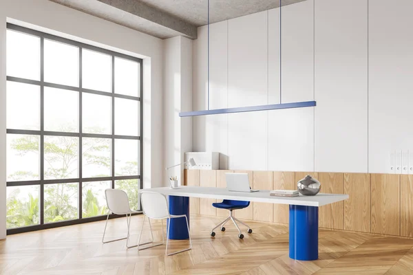Corner of modern CEO office with white walls, wooden floor, massive white and blue computer table with laptop, blue chair and two white chairs for visitors. 3d rendering