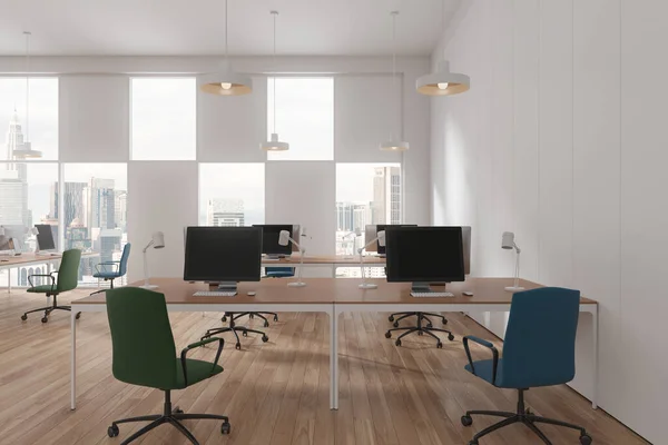 White and wooden coworking interior with armchairs and pc desktop in row, hardwood floor. Stylish office work zone and panoramic window on Kuala Lumpur skyscrapers. 3D rendering