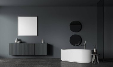 Gri duvarları, beton zemini, konforlu beyaz küveti, iki yuvarlak aynası ve üzerinde kare şeklindeki sahte posterleri asılı şık bir şifonyeri olan şık bir banyo. 3d oluşturma