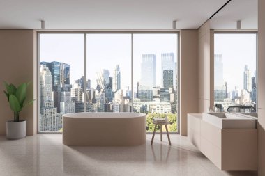 Modern banyo, bej duvarlar, fayanslı zemin, pencerenin yanında duran rahat bej küvet ve büyük aynalı rahat beyaz lavabo. 3d oluşturma