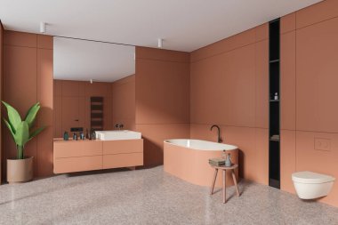 Turuncu duvarları olan şık bir banyonun köşesi, fayanslı zemin, rahat turuncu banyo küveti, üzerinde büyük ayna ve tuvalet olan beyaz lavabo. 3d oluşturma