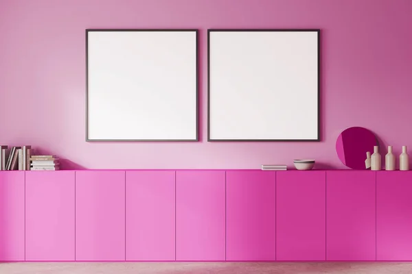 Bright pink home living room interior with long drawer, art decoration and books. Two mock up square canvas posters in row on fuchsia wall. 3D rendering