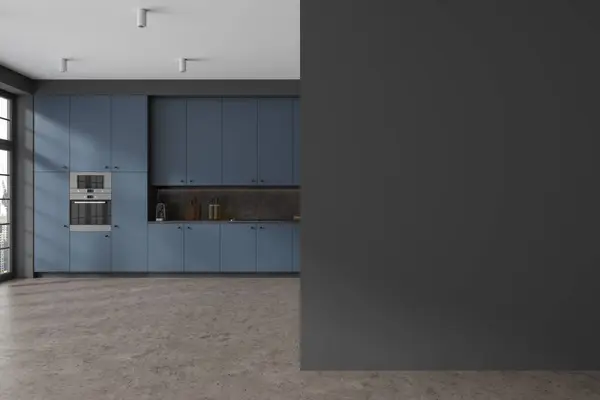 灰色の壁 コンクリートの床 シンクおよびオーブンで造られる快適な青いコップボードおよびキャビネットが付いているスタイリッシュな台所の内部および右のスペース壁をコピーして下さい 3Dレンダリング — ストック写真