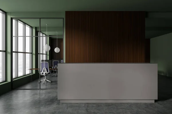 Interior of stylish office with green and wooden walls, concrete floor, comfortable gray reception counter and open space area in background. 3d rendering