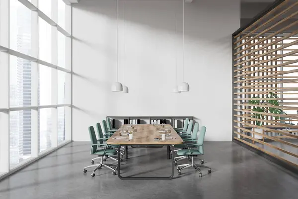 Interior of modern meeting room with white and wooden walls, concrete floor, long conference table with blue chairs and panoramic window with citysacpe. 3d rendering