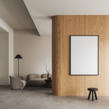 Beyaz ve ahşap duvarları, beton zemini, rahat gri koltuğu ve yuvarlak sehpanın yanında duran koltuğu ve sağında dikey maket posteri olan modern oturma odasının içi. 3d oluşturma