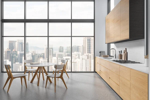 White home kitchen interior with dining table and cabinet, kitchenware with stove and coffee maker. Panoramic window on Kuala Lumpur skyscrapers. 3D rendering