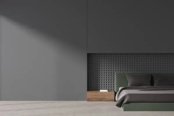 Interior of stylish bedroom with gray walls, concrete floor, comfortable green king size bed with dark wooden nightstand and mock up wall on the right. 3d rendering