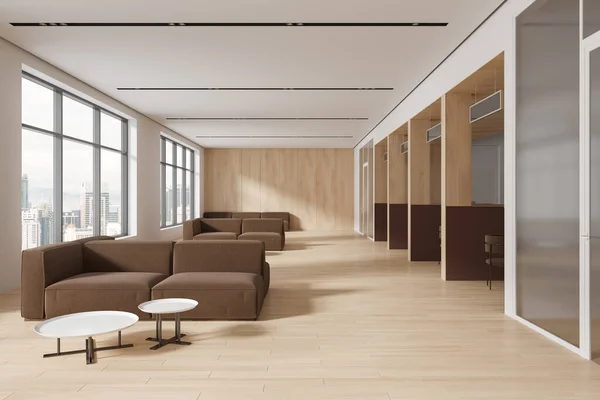 Interior of modern bank with white and wooden walls, wooden floor, row of teller counters with chairs and cozy brown sofas with coffee tables. 3d rendering